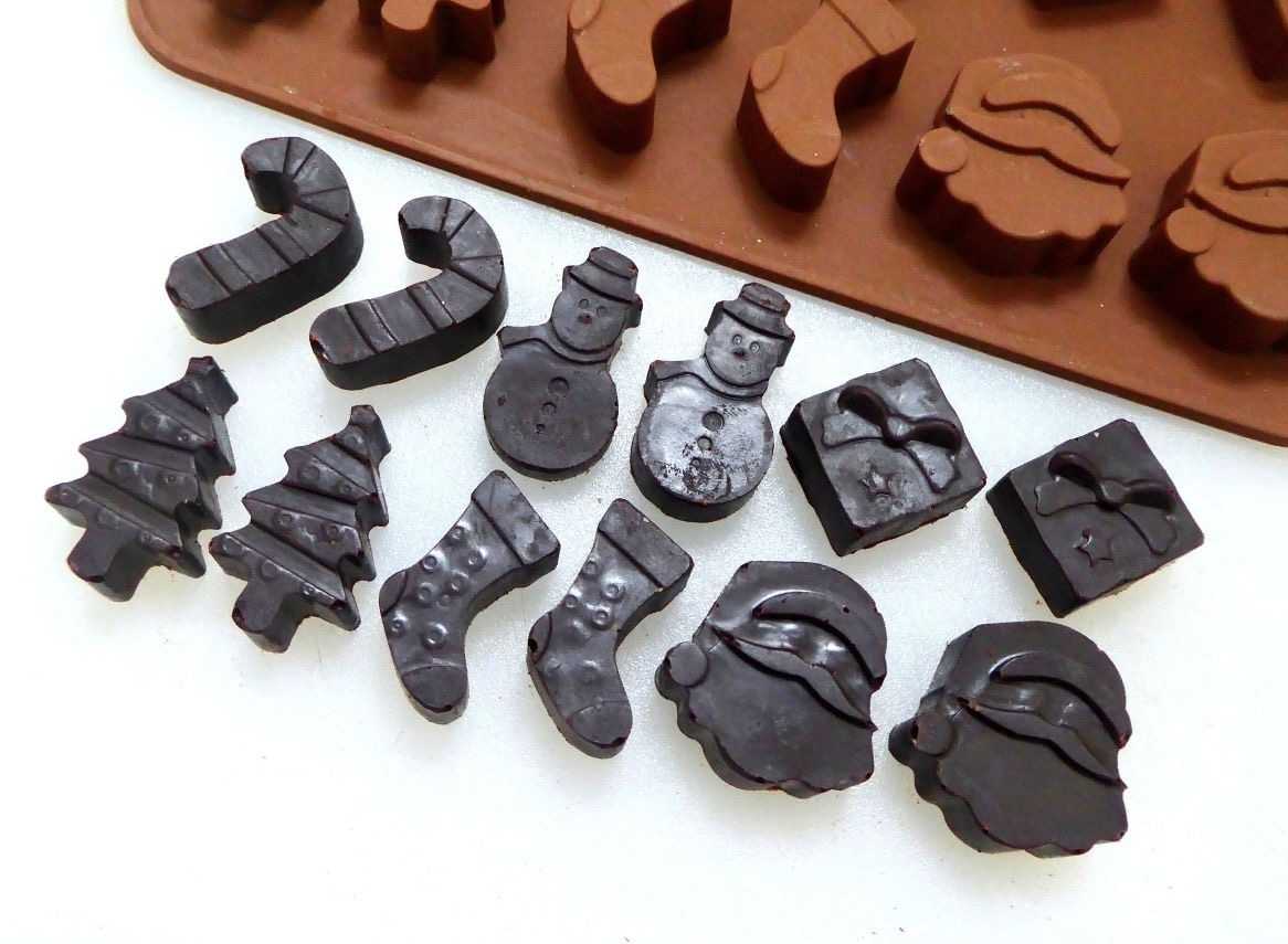 dairy free chocolates showing chocolate arranged at a angle with the chocolate mould in the top right corner