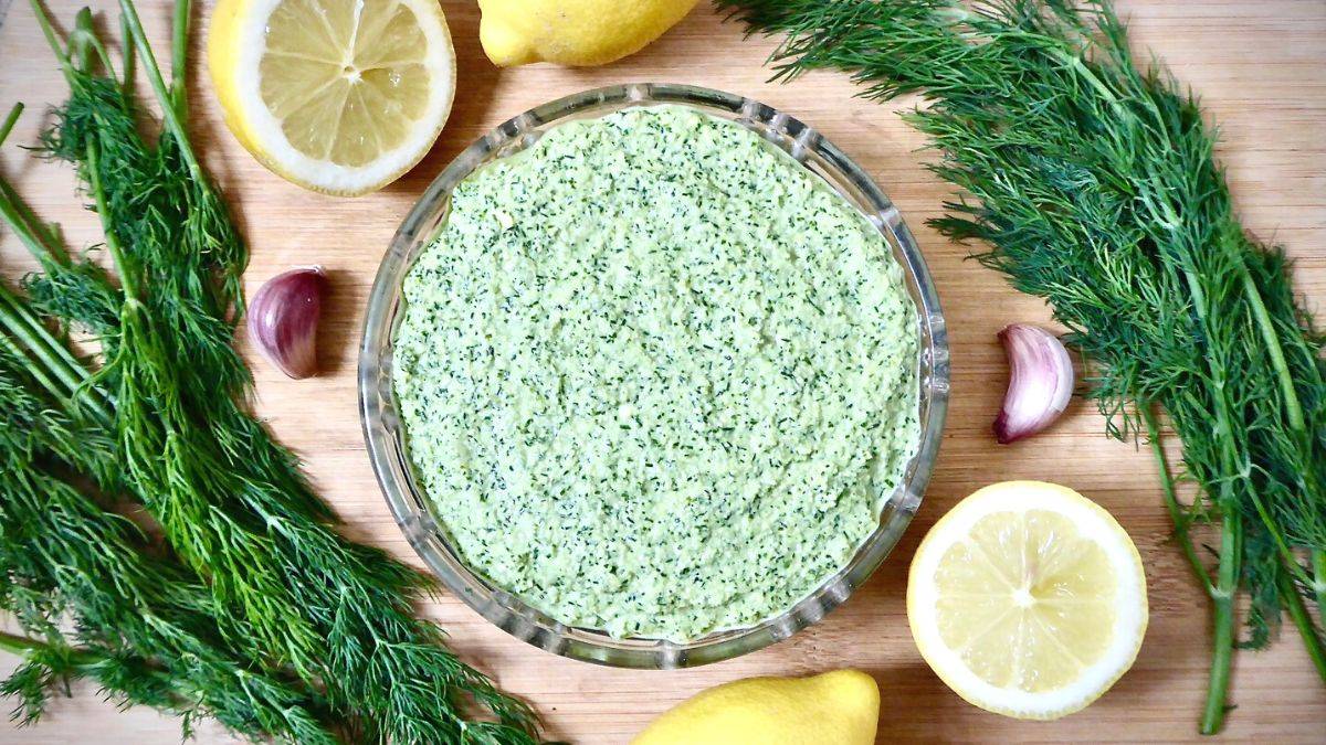 sprouted lemon dill hummus in bowl aerial shot