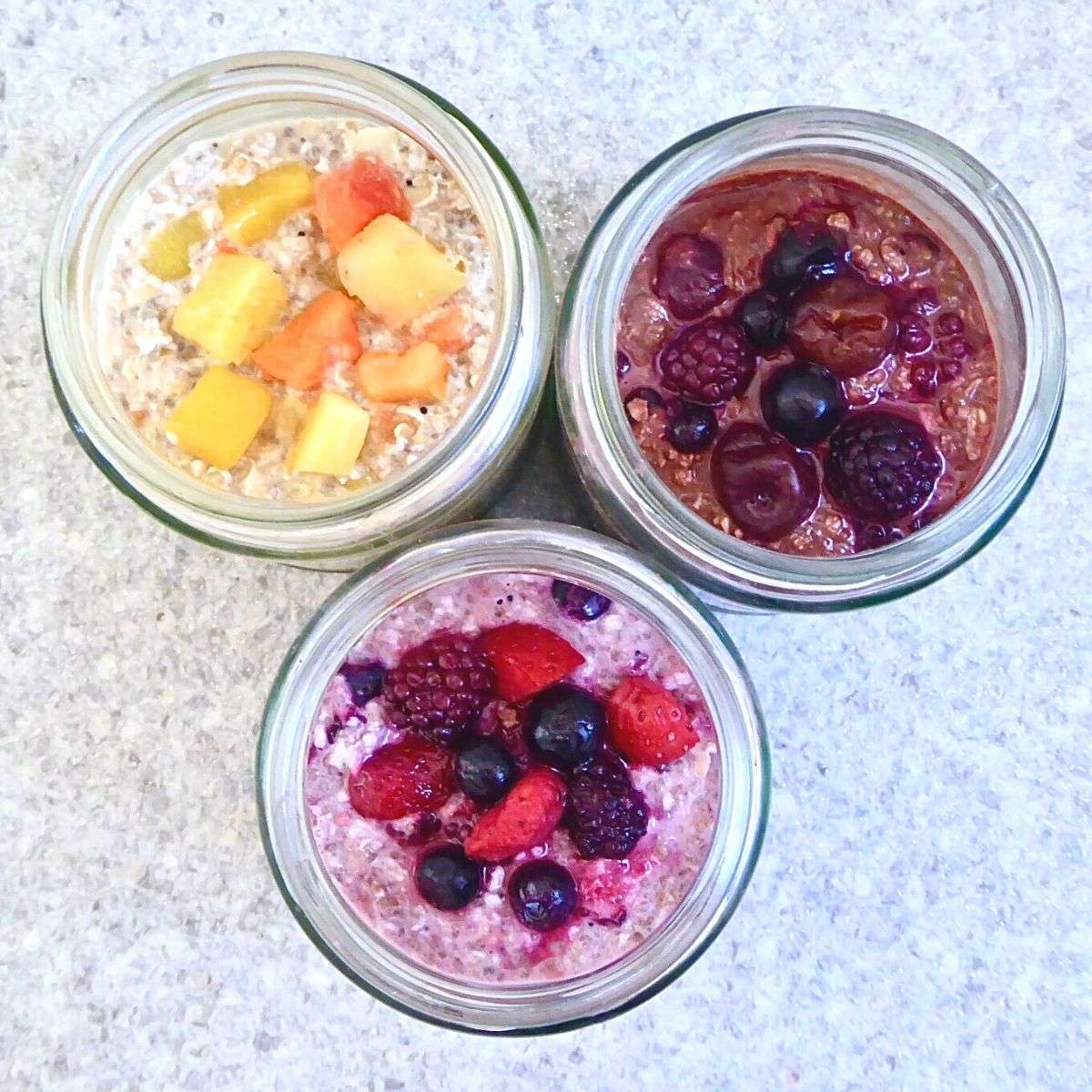 3 variations of overnight oats topped with fruit
